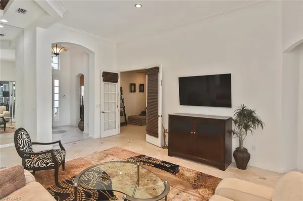 a large kitchen with a large counter top appliances and cabinets