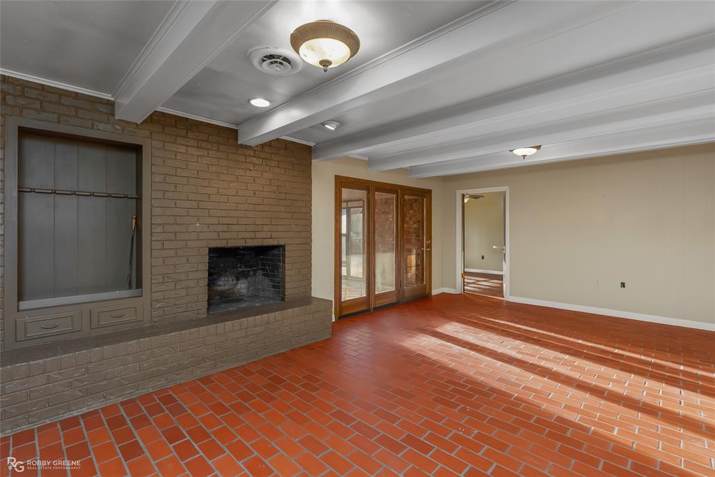 2534 Highway 146 Homer, LA 71040 - Photo 8 of 38 Den with wood burning fireplace & built in's