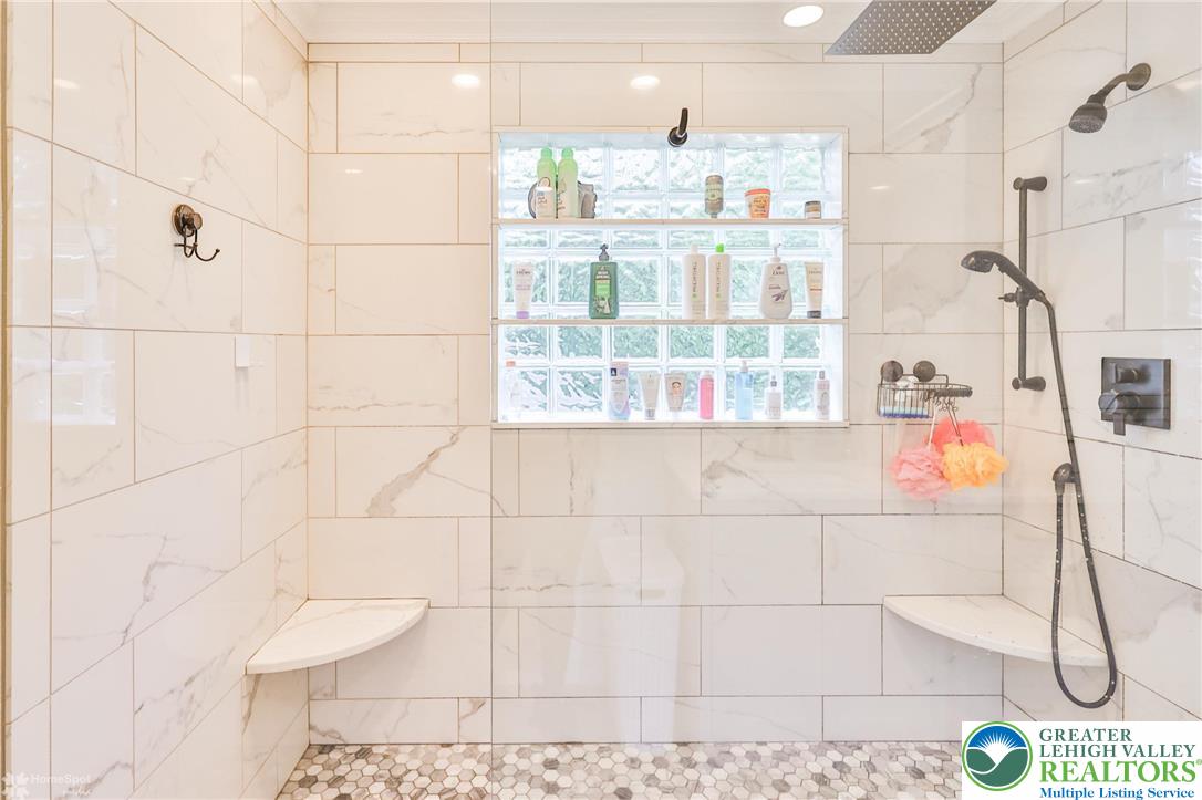 1147 Jacobsburg Road Wind Gap, PA 18091 - Photo 31 of 70 a bathroom with a bathtub and shower