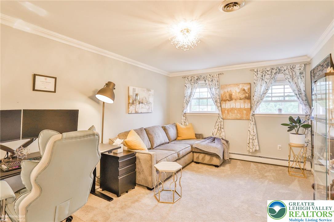 1147 Jacobsburg Road Wind Gap, PA 18091 - Photo 36 of 70 a living room with furniture and a flat screen tv
