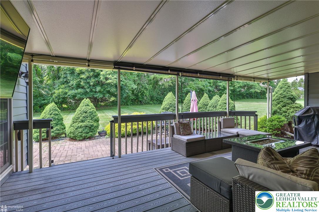 1147 Jacobsburg Road Wind Gap, PA 18091 - Photo 50 of 70 a balcony with furniture and wooden floor