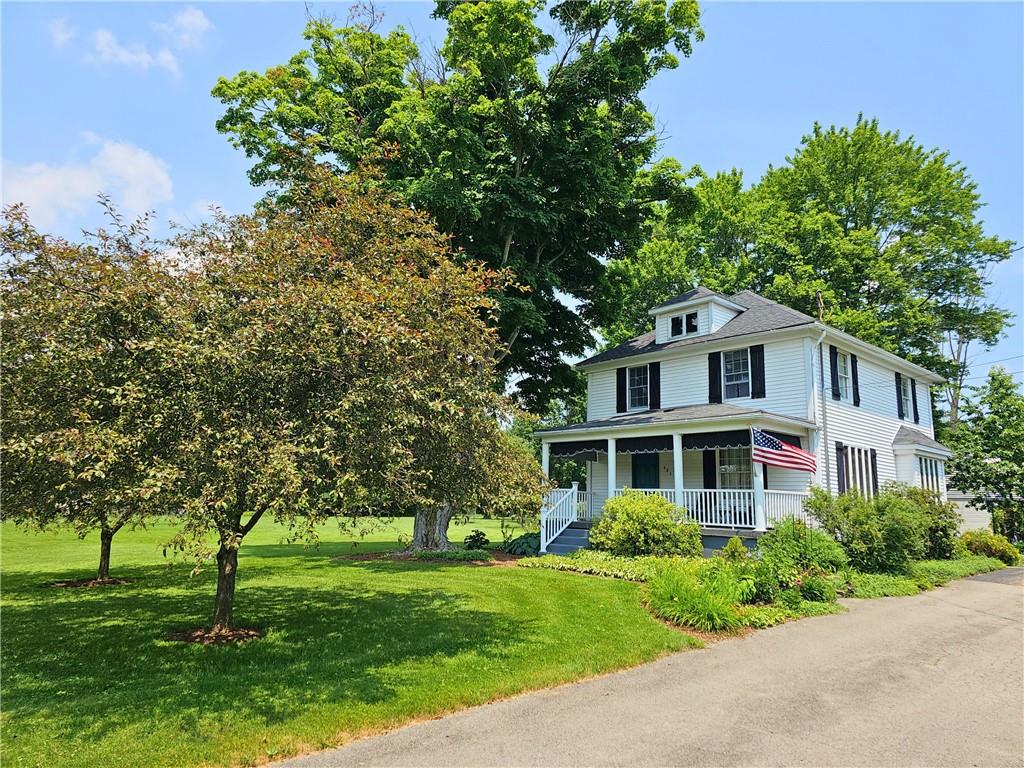 685 South Keel Ridge Road Hermitage, PA 16148 - Photo 1 of 42 a front view of a house with a garden