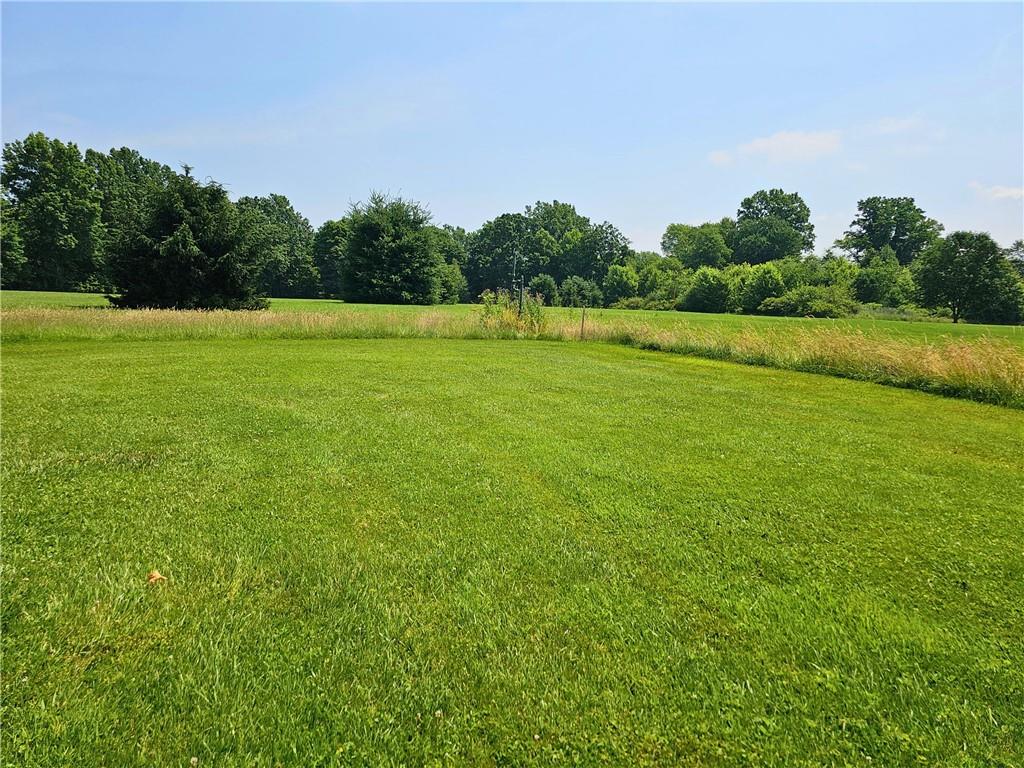 685 South Keel Ridge Road Hermitage, PA 16148 - Photo 33 of 42 a view of a green field with wooden fence