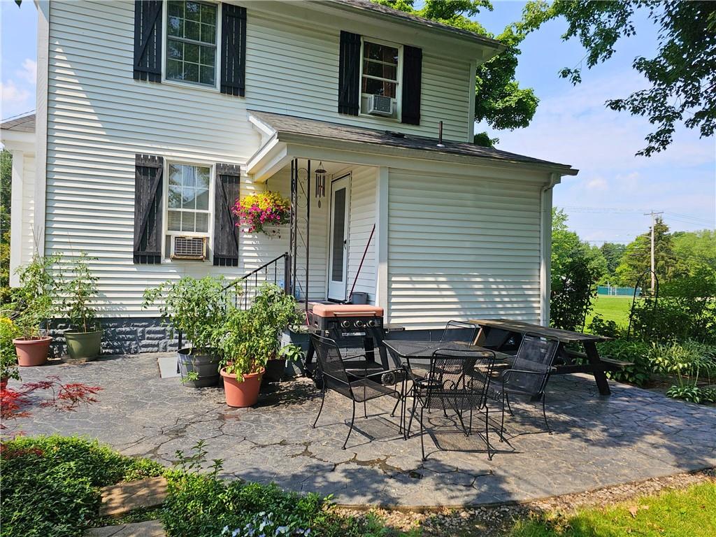 685 South Keel Ridge Road Hermitage, PA 16148 - Photo 5 of 42 a backyard of a house with table and chairs