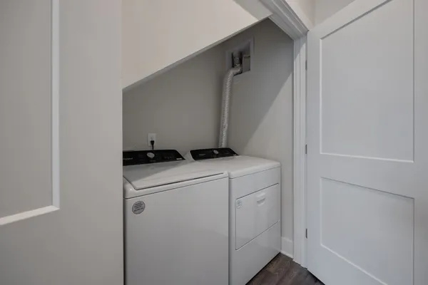 a utility room with dryer and washer