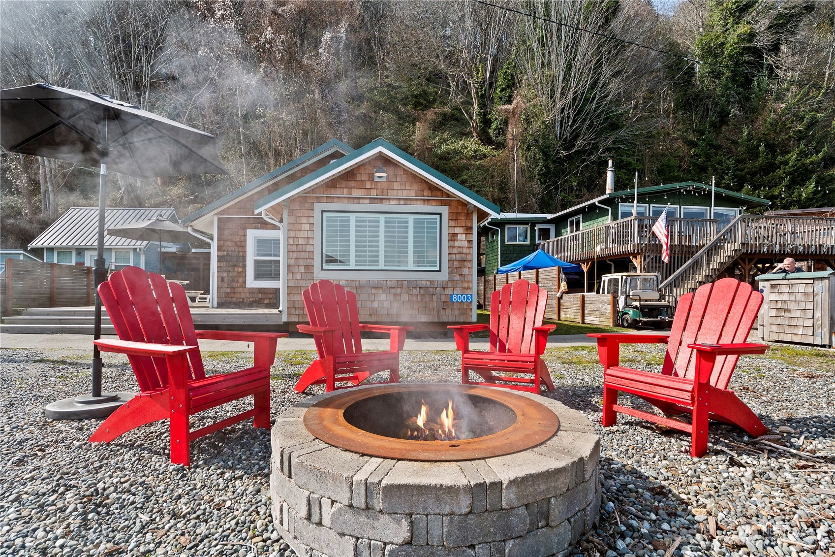 8003 Possession Beach Walk Clinton, WA 98236 - Photo 2 of 31 a view of a chairs in front of house