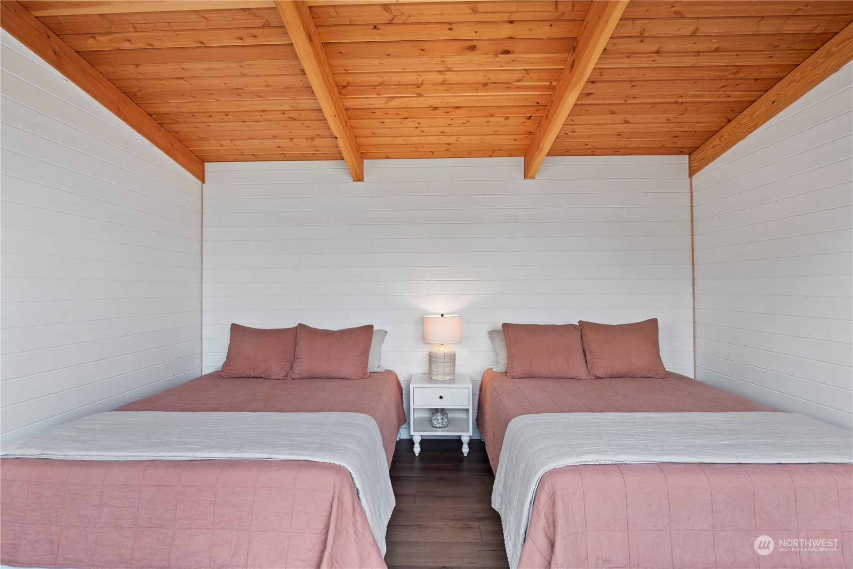 8003 Possession Beach Walk Clinton, WA 98236 - Photo 24 of 31 a bedroom with two bed and a window