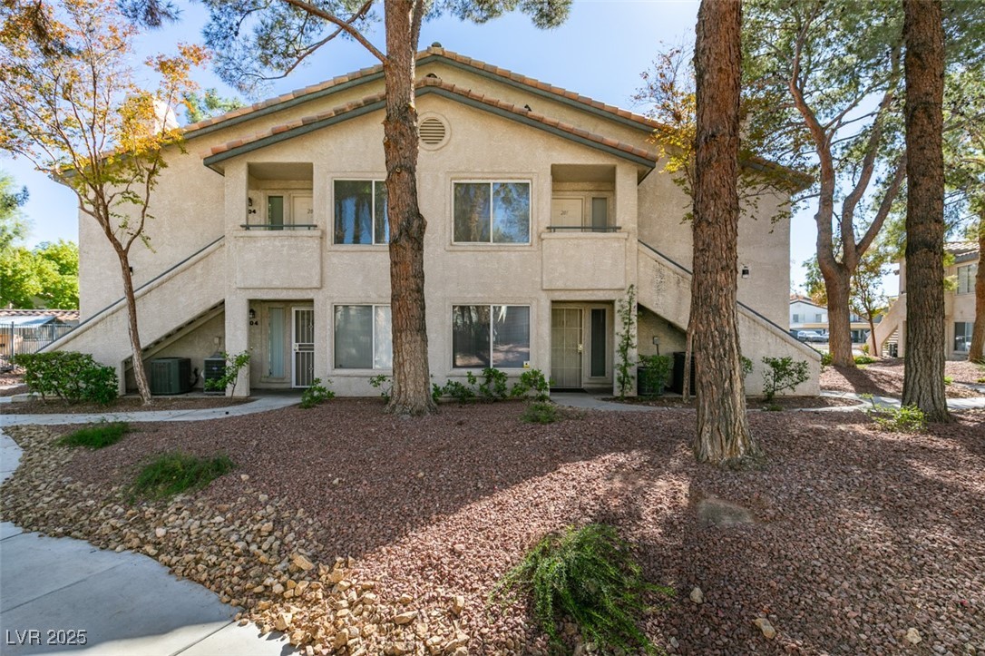 View of building exterior featuring stairs