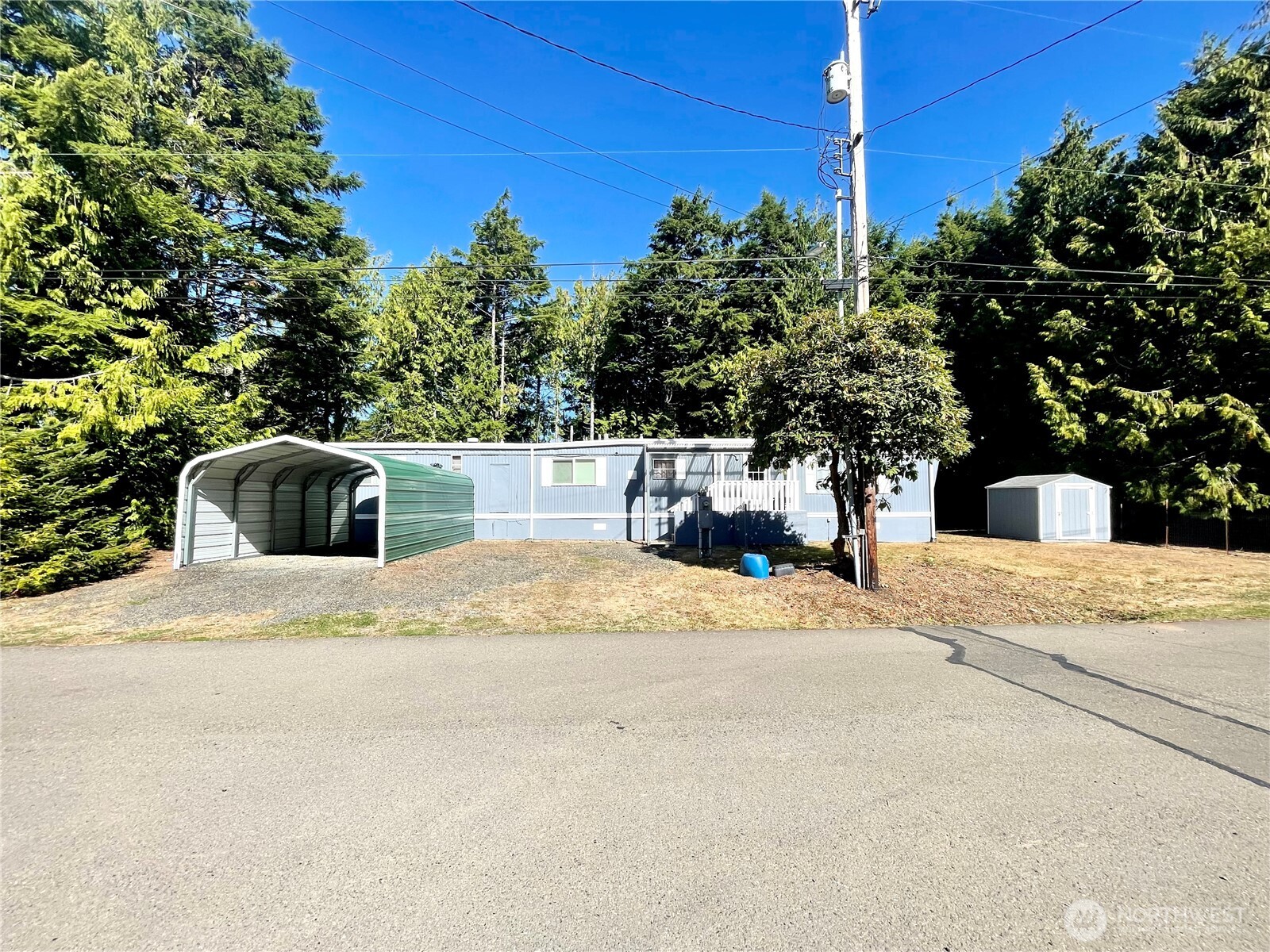 55 Paradise Lane Pacific Beach, WA 98571 - Photo 2 of 36 a view of outdoor space yard and basketball court
