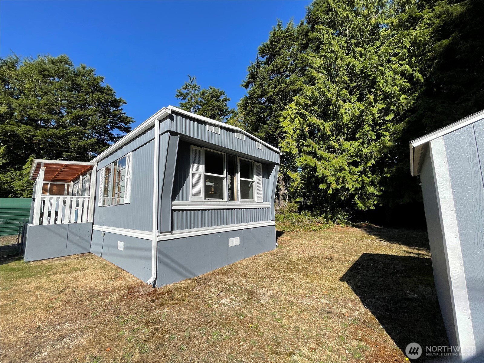 55 Paradise Lane Pacific Beach, WA 98571 - Photo 22 of 36 a front view of a house with a yard