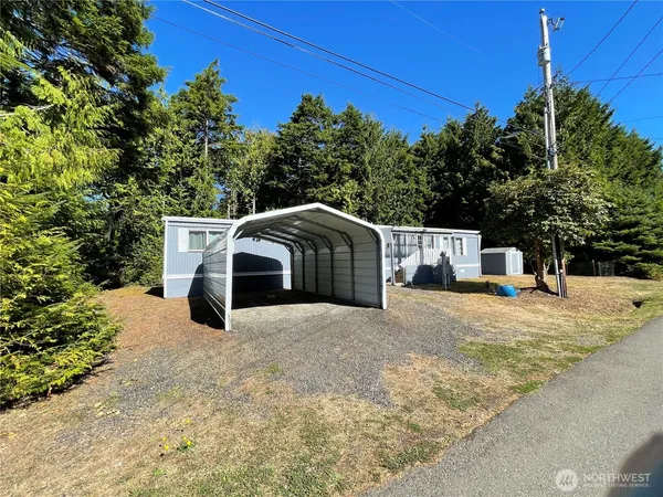 a house with trees in the background