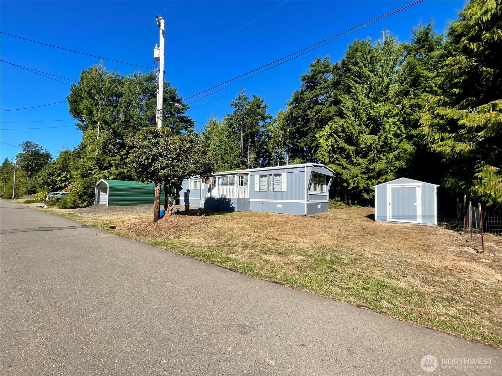 55 Paradise Lane Pacific Beach, WA 98571 - Photo 34 of 36 a house view with a outdoor space