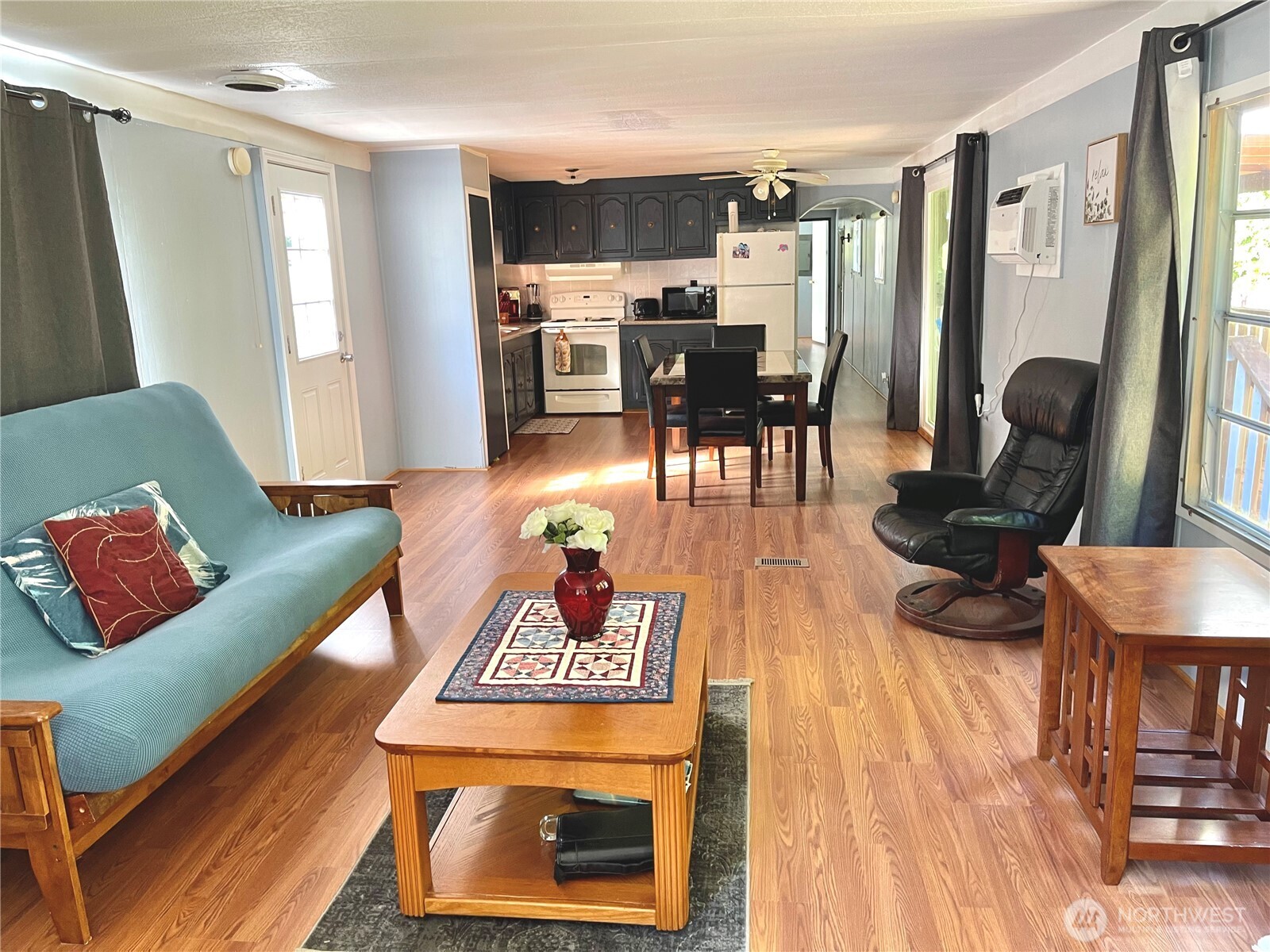 55 Paradise Lane Pacific Beach, WA 98571 - Photo 5 of 36 a living room with furniture and wooden floor