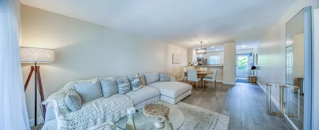 a living room with large windows