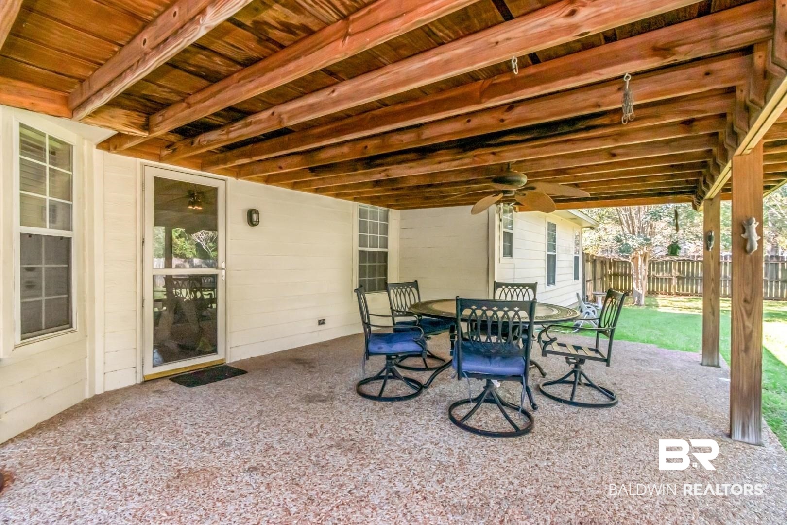 1345 Camden Court Mobile, AL 36695 - Photo 17 of 31 View of patio featuring outdoor dining space and a ceiling fan