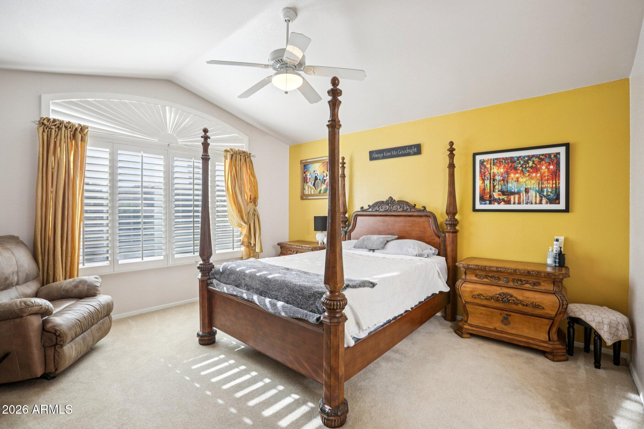 13414 South 47th Way Phoenix, AZ 85044 - Photo 19 of 32 a spacious bedroom with a bed and a couch