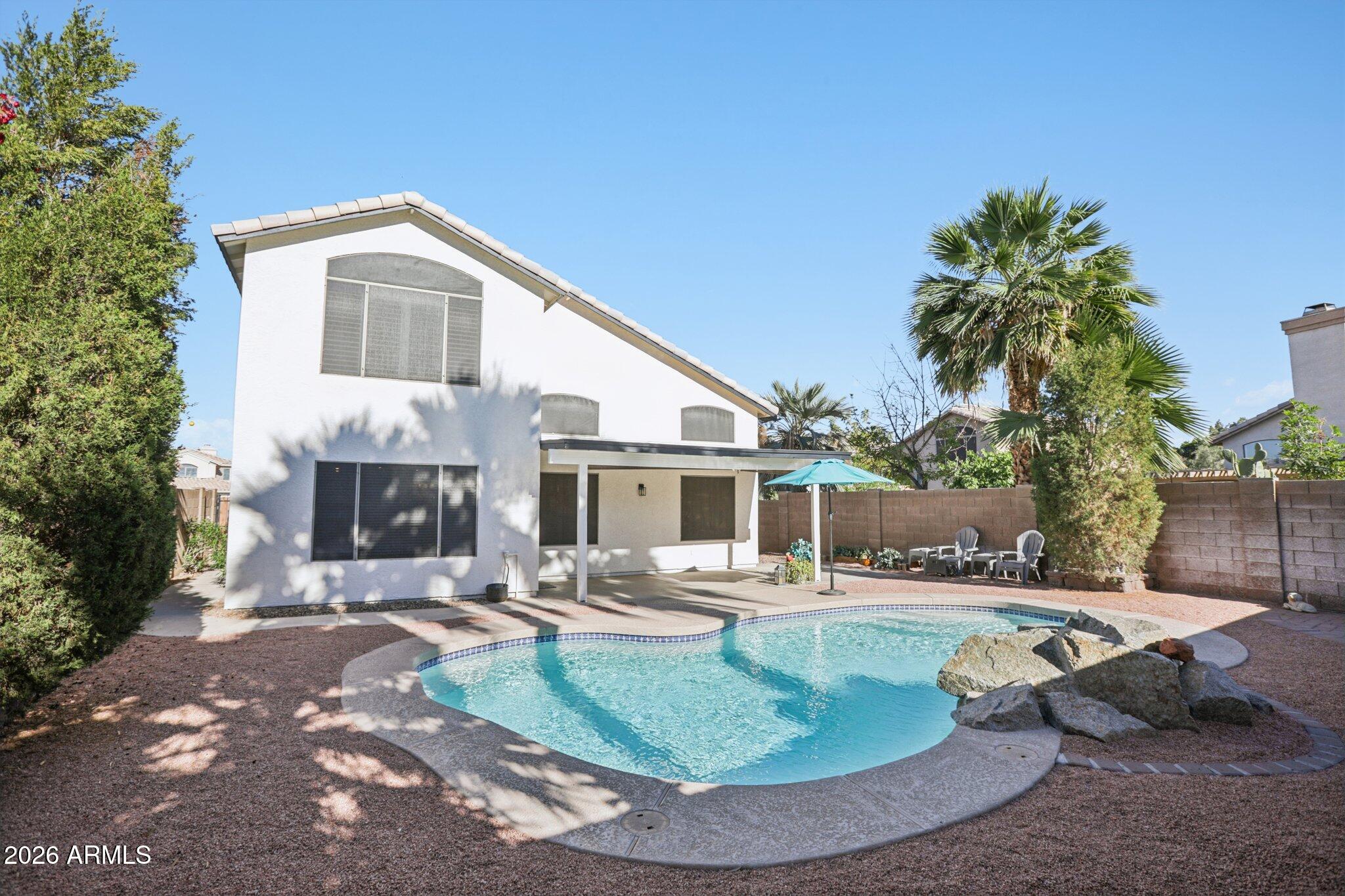 13414 South 47th Way Phoenix, AZ 85044 - Photo 28 of 32 a view of a house with a yard