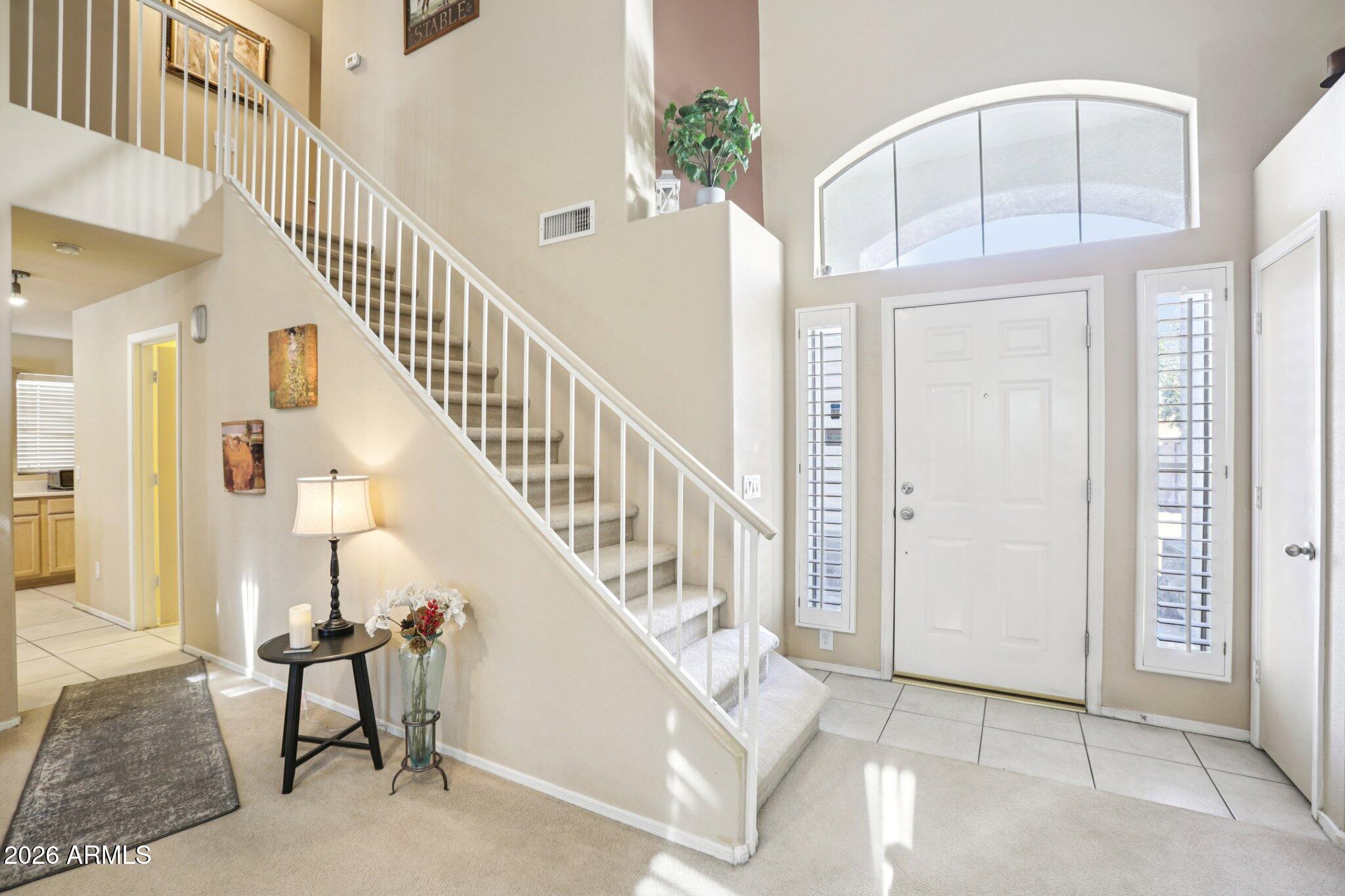 13414 South 47th Way Phoenix, AZ 85044 - Photo 4 of 32 a view of entryway and hall with wooden floor