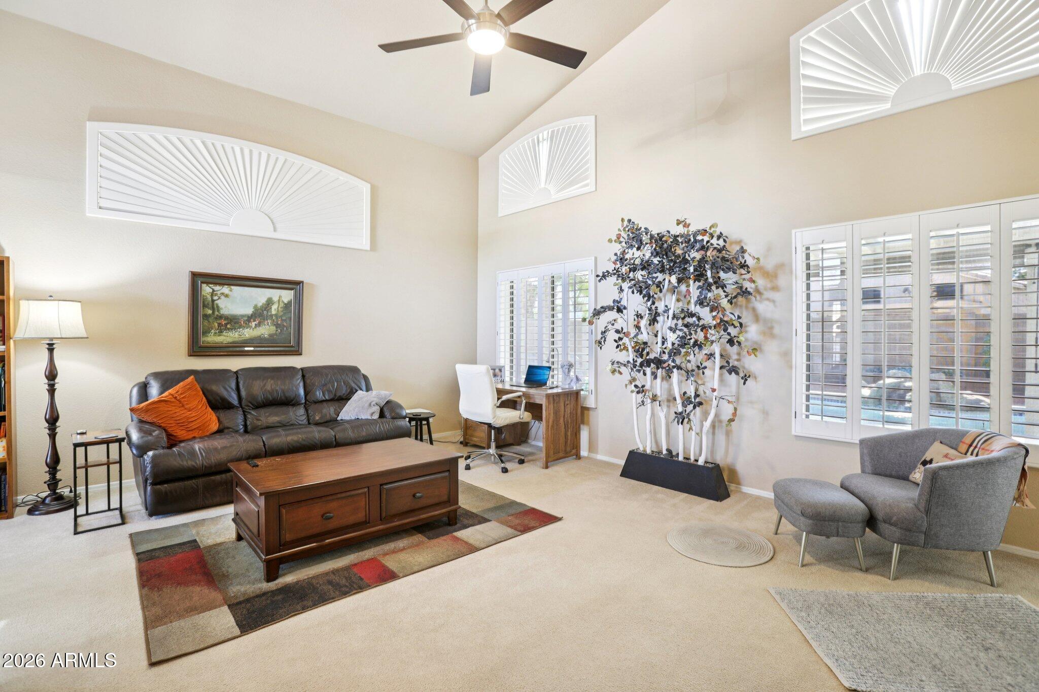 13414 South 47th Way Phoenix, AZ 85044 - Photo 6 of 32 a living room with furniture and a large window