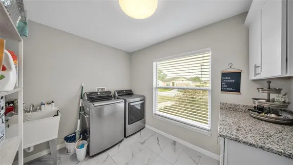 a kitchen with a stove and a sink