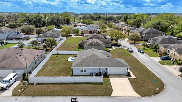 an aerial view of a house with a garden