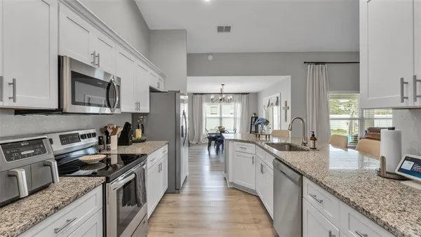 a large kitchen with a lot of counter space