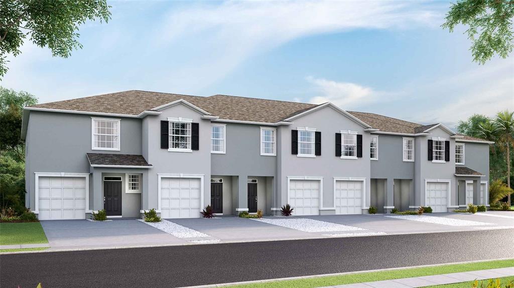 32463 Welling Blade Loop Wesley Chapel, FL 33545 - Photo 41 of 42 a front view of a house with a garage