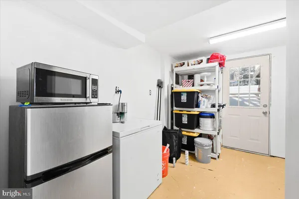 a view of a workspace with furniture