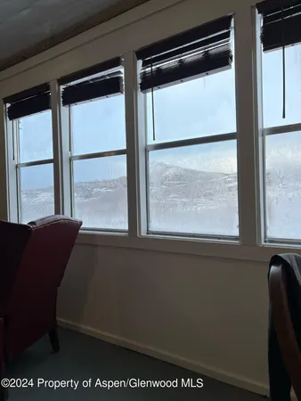 a living room with a large window