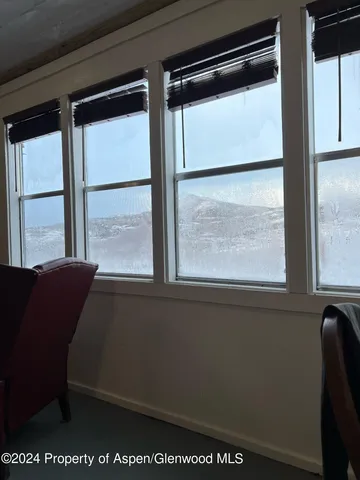 a living room with a large window