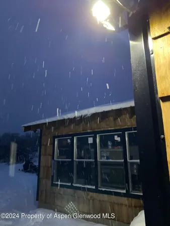 a view of a room with a fireplace