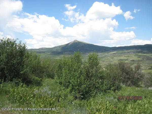 a view of a city and mountains