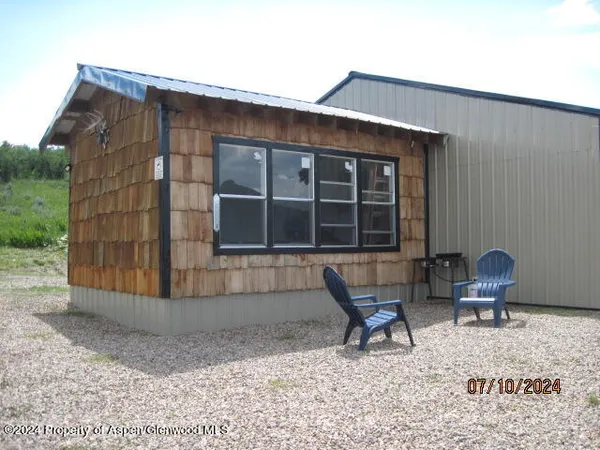 a building outdoor space with patio furniture