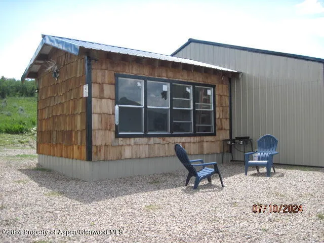 a building outdoor space with patio furniture