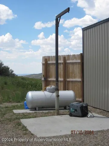 a view of a terrace with furniture