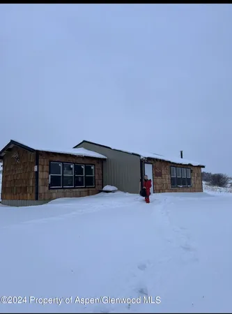 a view of a big room with wooden fence