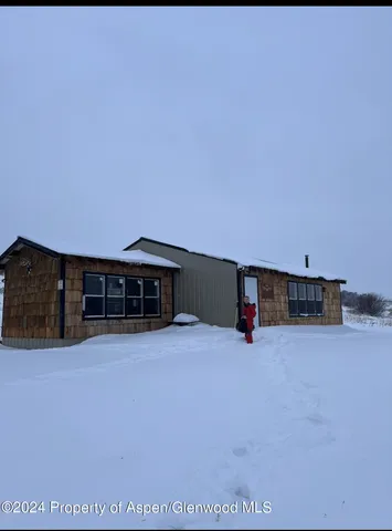a view of a big room with wooden fence