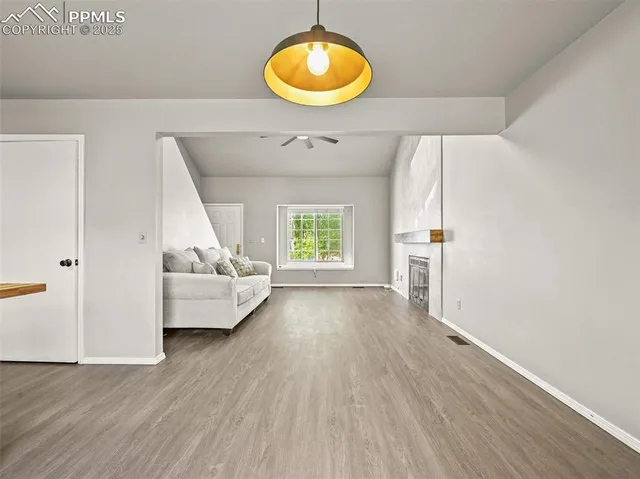 a view of livingroom with furniture and wooden floor