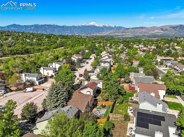 an aerial view of residential house and outdoor space