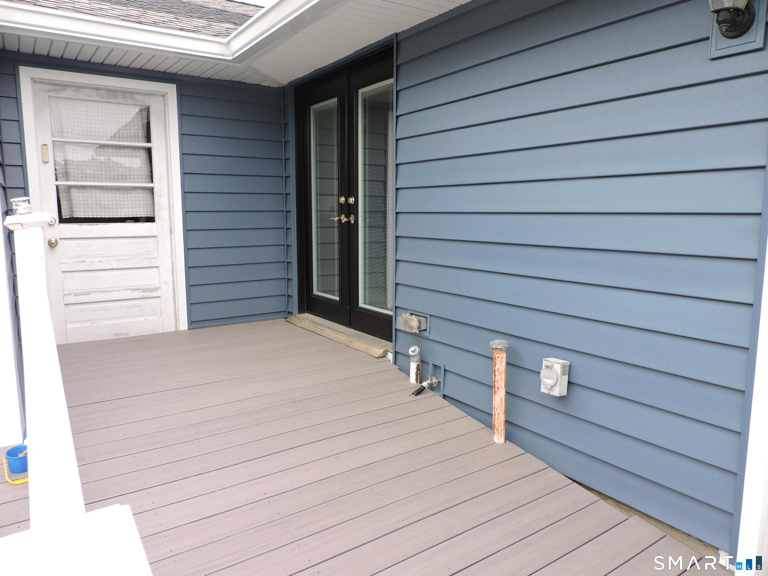 137 Maskel Road South Windsor, CT 06074 - Photo 26 of 27 Handicapped deck made of trex. Original stairs still under deck.