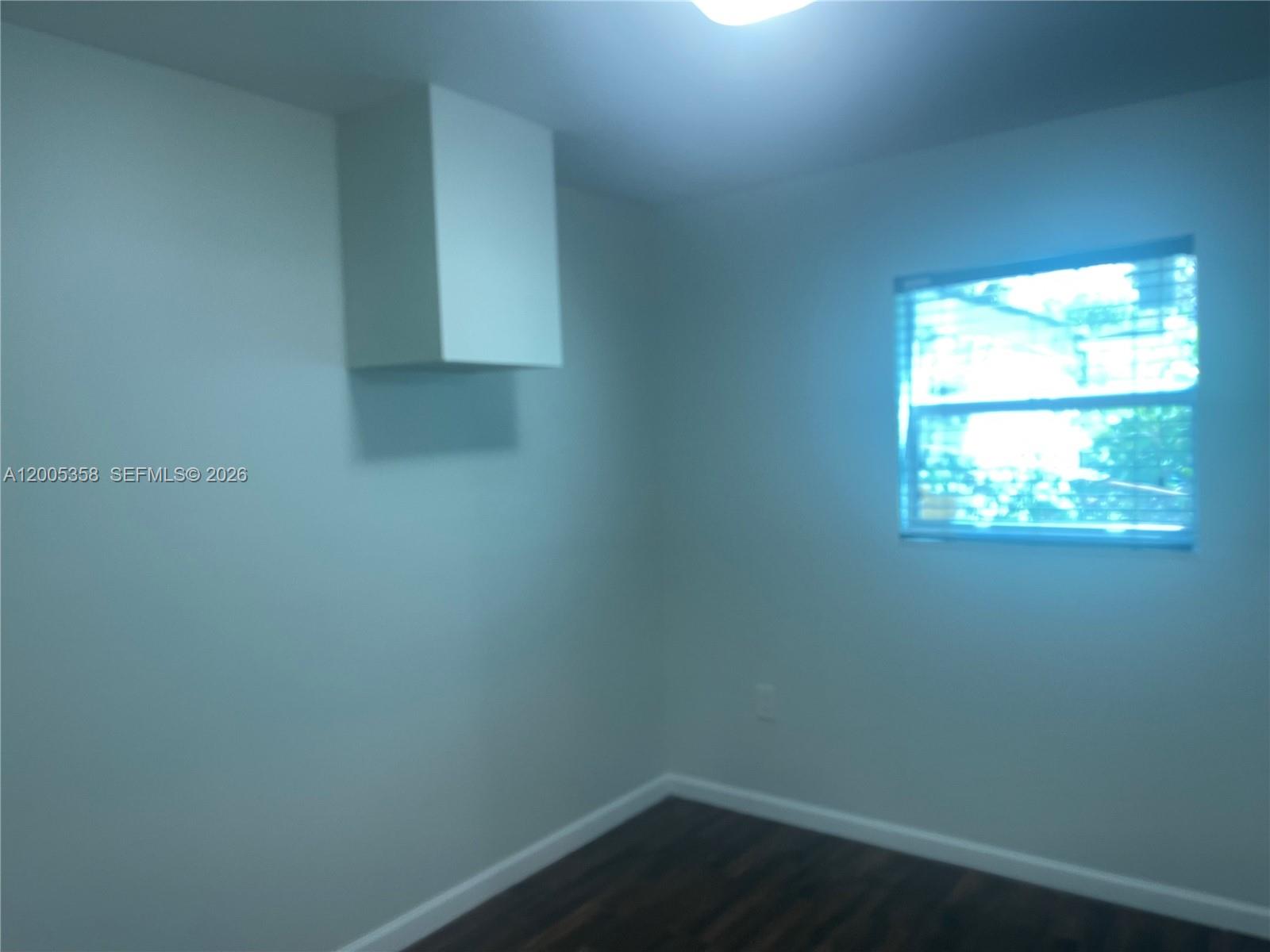 554 Northeast 74th Street, Unit 2 Miami, FL 33138 - Photo 11 of 30 a small space with a window