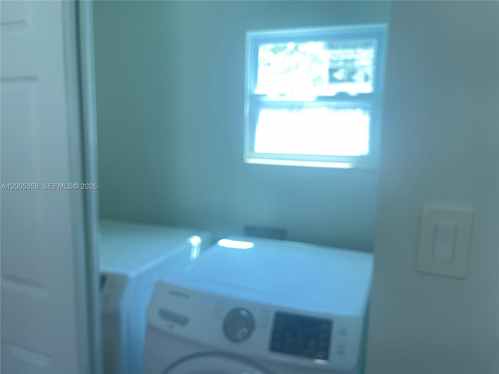 554 Northeast 74th Street, Unit 2 Miami, FL 33138 - Photo 21 of 30 a view of an empty room with a window