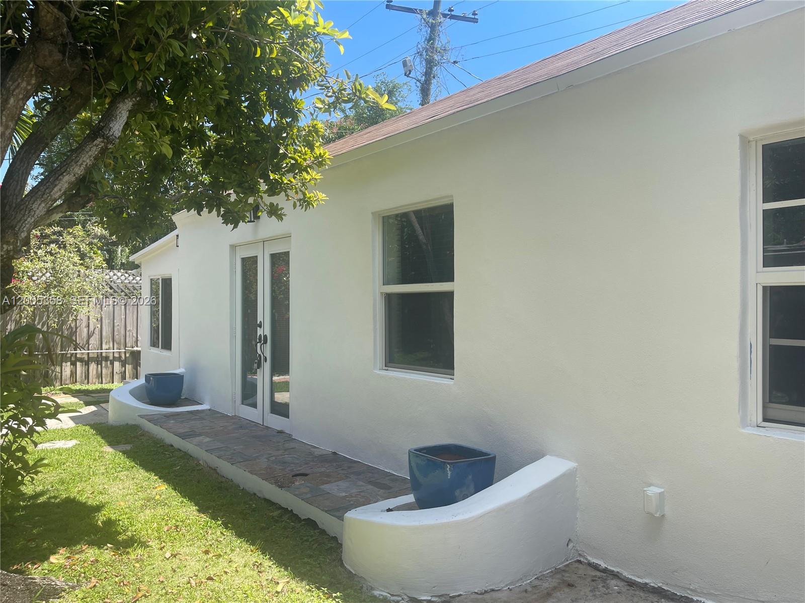 554 Northeast 74th Street, Unit 2 Miami, FL 33138 - Photo 28 of 30 a view of house and outdoor space