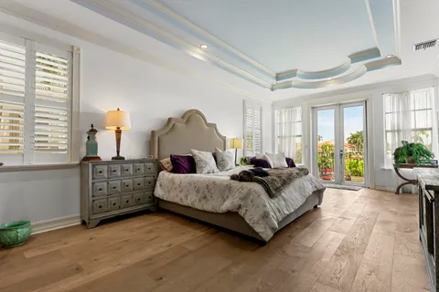 a living room with furniture and windows