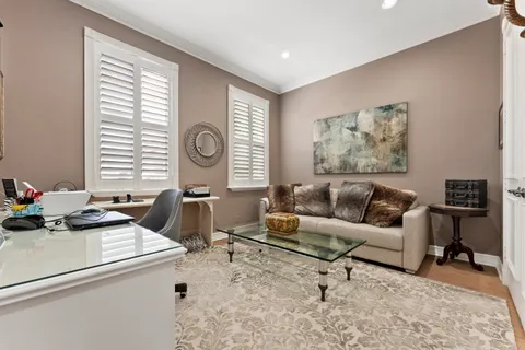 a living room with furniture and window