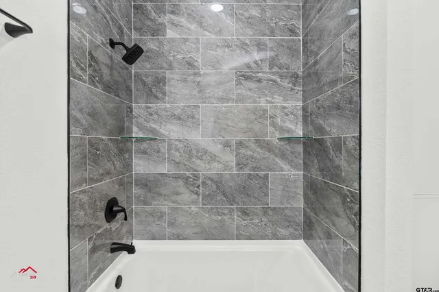 a bathroom with a bathtub