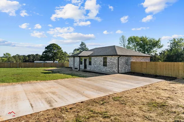 a house view with a garden space