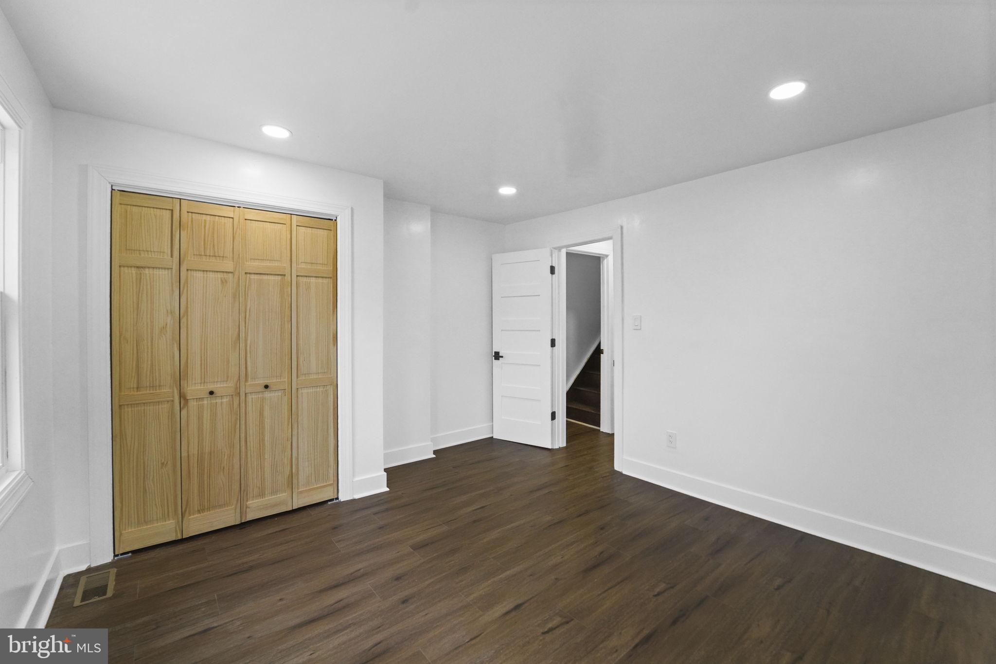 121 Parker Place Hamilton, NJ 08609 - Photo 28 of 37 a view of an empty room with wooden floor