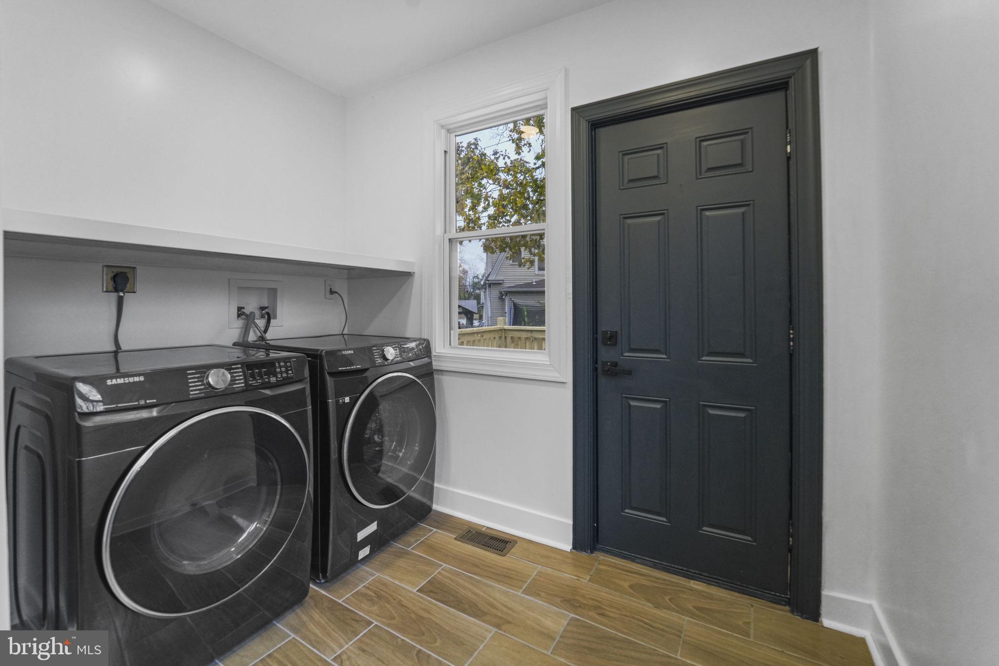 121 Parker Place Hamilton, NJ 08609 - Photo 32 of 37 a utility room with dryer and washer