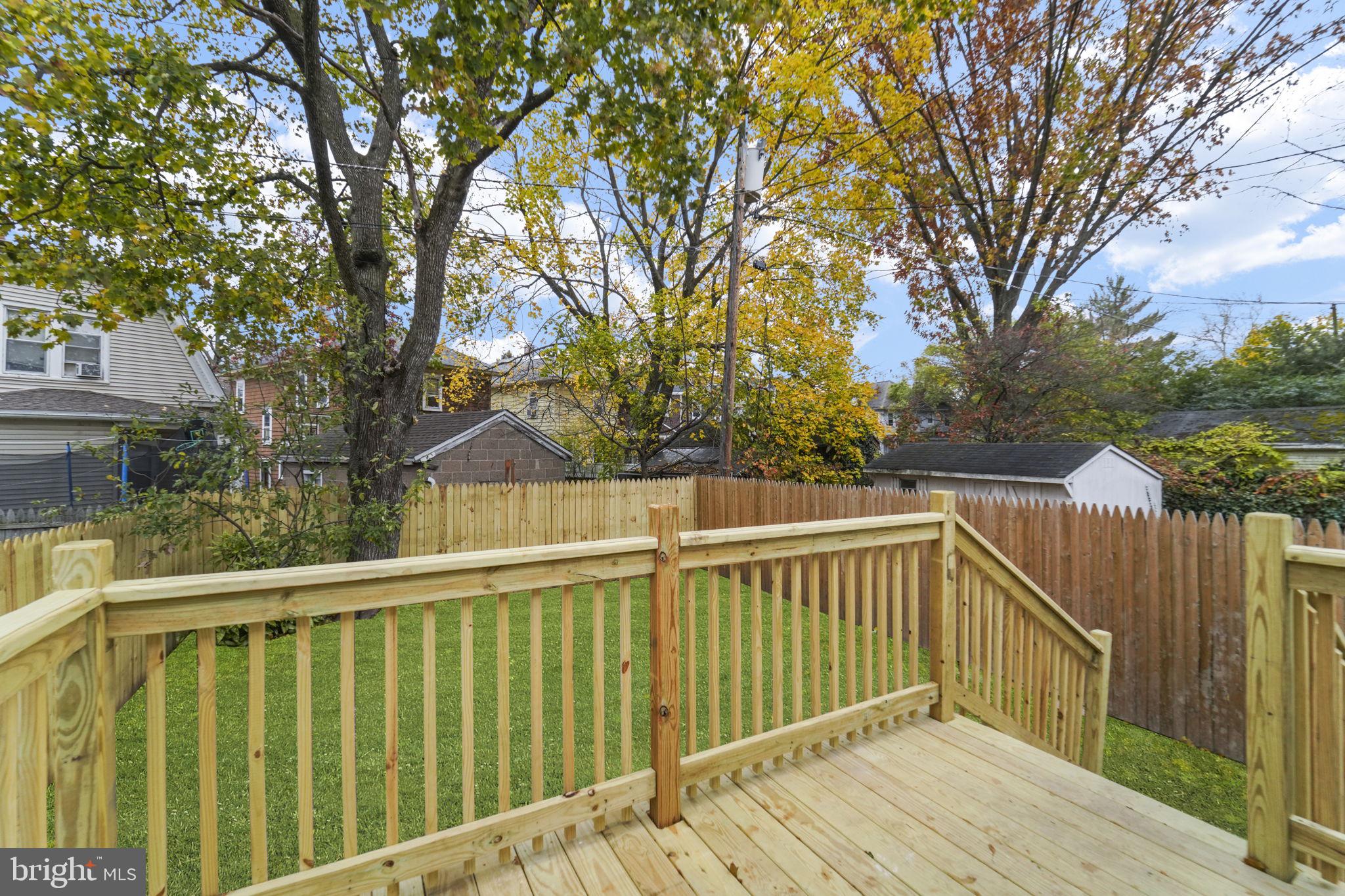 121 Parker Place Hamilton, NJ 08609 - Photo 33 of 37 a view of a wooden roof deck